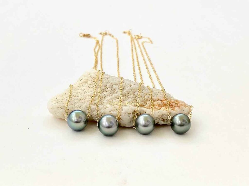 Single 10-11mm Tahitian pearl floats on a cable chain